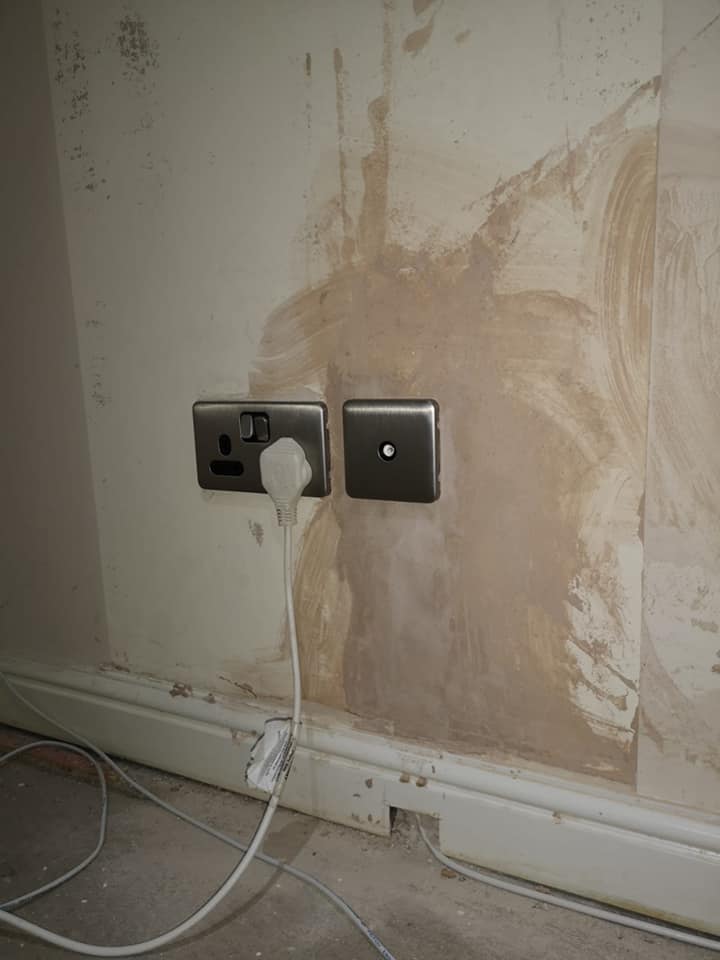 Brushed steel sockets and switches installed