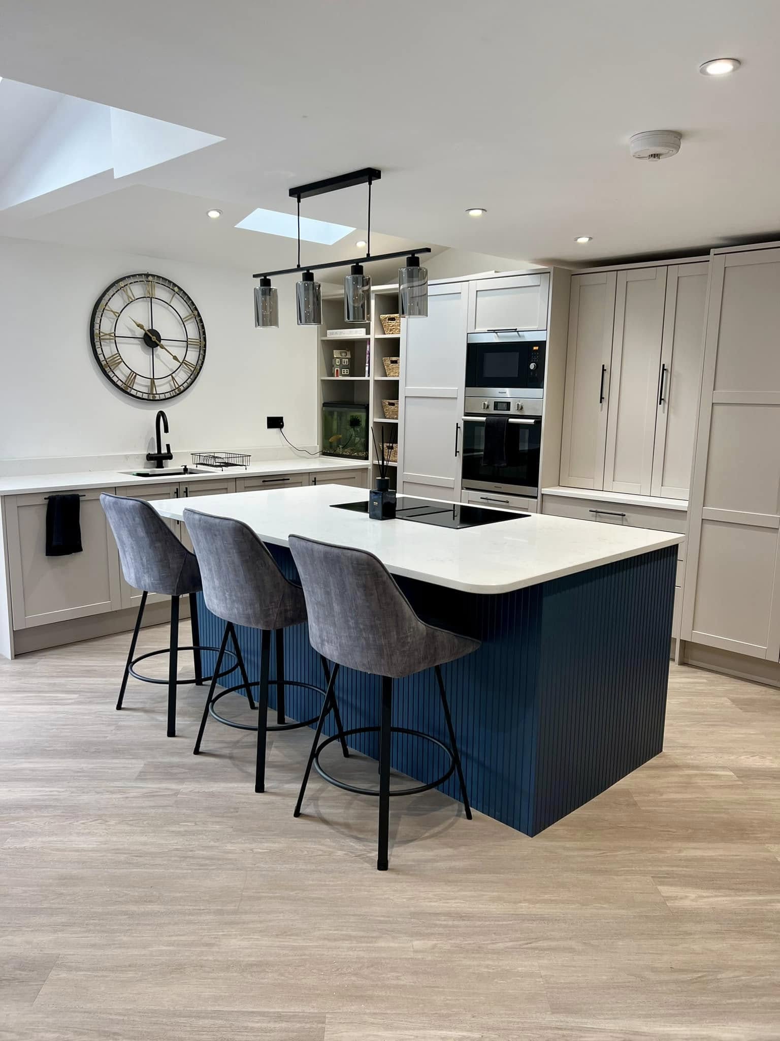 Kitchen island marble worktop with recessed lighting