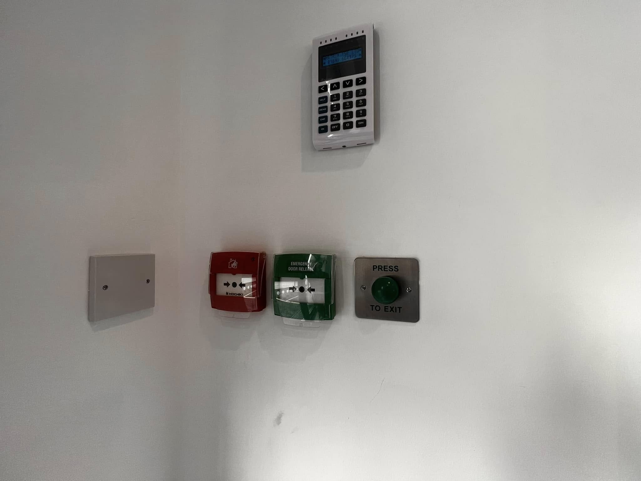 Access control and fire safety components neatly installed